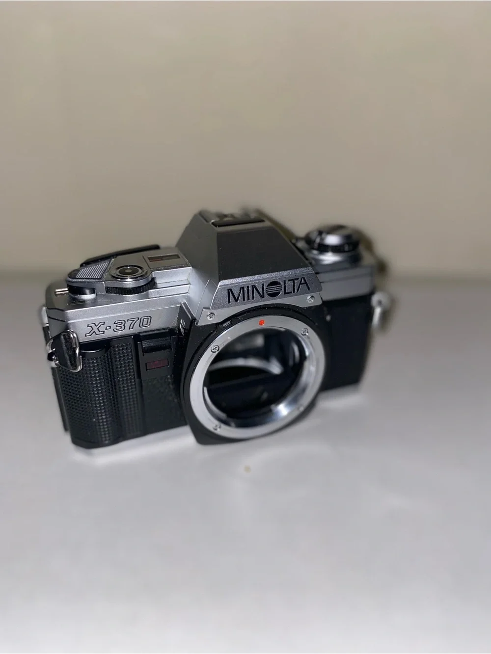 35mm SLR Film X-370 Camera Body Silver & Black. Also 200mm Telephoto Lens. Flash